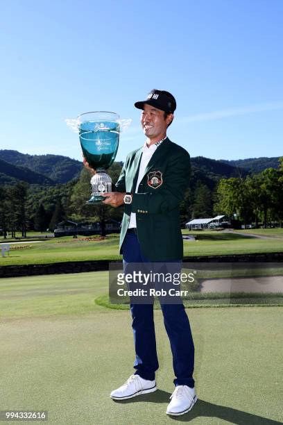 Kevin Na poses with the trophy after winning the A Military Tribute At The Greenbrier held at the Old White TPC course on July 8, 2018 in White...