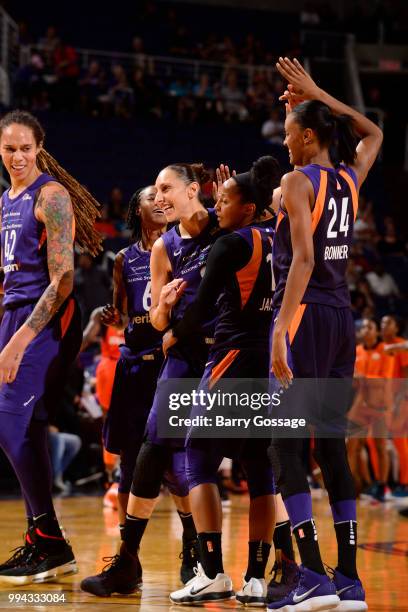 Diana Taurasi of the Phoenix Mercury celebrates on the court with teammates during the game against the Connecticut Sun on July 5, 2018 at Talking...