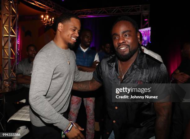 Mack Wilds and Wale attend the 2018 Essence Festival - Day 3 on July 8, 2018 in New Orleans, Louisiana.