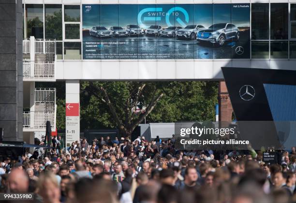 Visitors of the Motor Show walk underneath a bridge in Frankfurt am Main, Germany, 16 September 2017. The International Motor Show Germany takes...