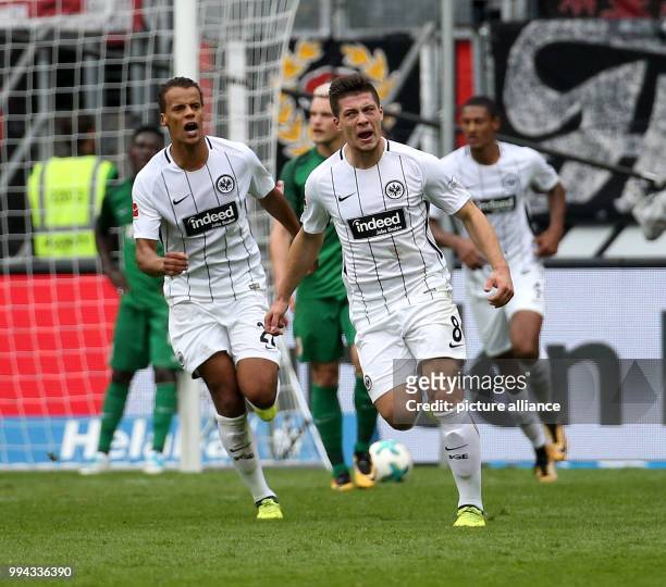 Frankfurt's Luka Jovic celebrates his 2-1 goal with teammate Timothy Chandler during the German Bundesliga soccer match between Eintracht Frankfurt...
