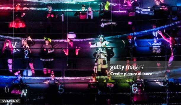 The singer Andreas Schager as "Parsifal" singing with choir members at the photo rehearsal of Richard Wagner's "Parsifal" in Hamburg, Germany, 11...