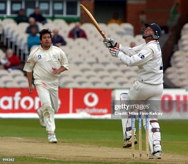 Mike Atherton of Lancashire sees his shot off James Ormond of Leicestershire go for six on the final day of the CricInfo County Championship match at...