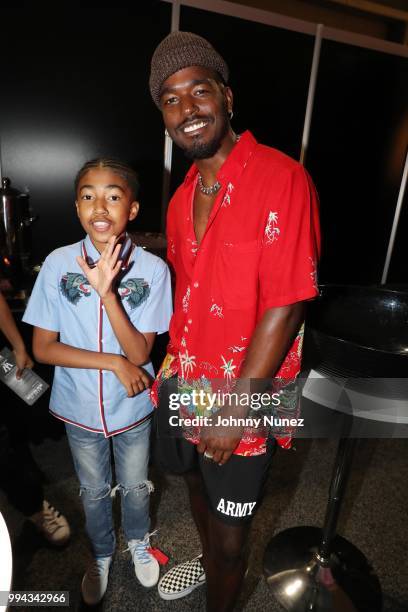 Miles Brown and Luke James attend the 2018 Essence Festival - Day 3 on July 8, 2018 in New Orleans, Louisiana.