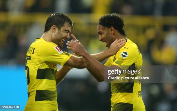 Sokratis and Pierre-Emerick Aubameyang of Dortmund celebrate the goal making it 2:0 during the German Bundesliga football match between Borussia...