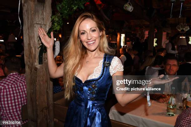 Television presenter Andrea Kaiser in the Käferzelt on the first Sunday of this year's Oktoberfest in Munich, Germany, 17 September 2017. This year's...