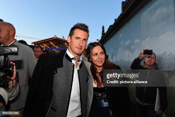 Retired German soccer player Miroslav Klose and his wife Sylwia on the first Sunday of this year's Oktoberfest in Munich, Germany, 17 September 2017....