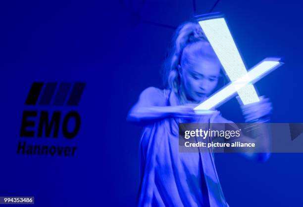 Dancer performs on stage at the opening of the 2017 EMO machine tool show in Hanover, Germany, 18 September 2017. Over 2,200 exhibitors from 45...