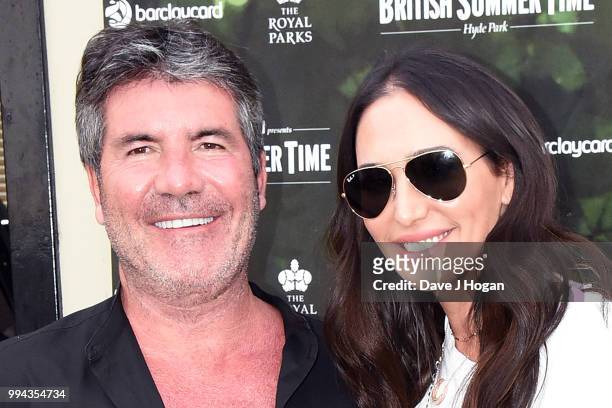 Simon Cowell and Lauren Silverman pose backstage as Barclaycard present British Summer Time Hyde Park at Hyde Park on July 6, 2018 in London, England.