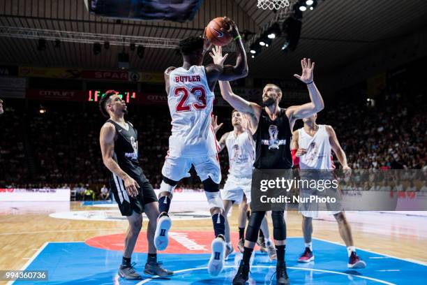 Jimmy Butler from United States of America of Minnesota Timberwolves defended by Marc Gasol from Spain of Memphis Grizzlies and Dillon Brooks from...