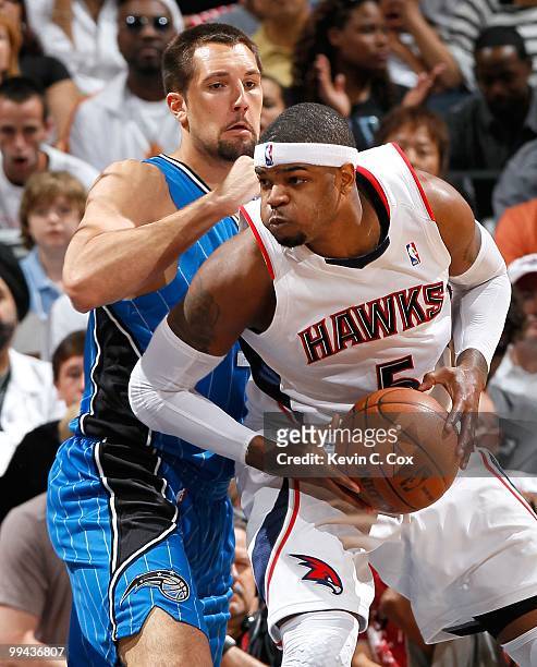 Josh Smith of the Atlanta Hawks and Ryan Anderson of the Orlando Magic during Game Three of the Eastern Conference Semifinals during the 2010 NBA...