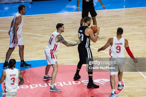 Marc Gasol from Spain of Memphis Grizzlies defended by Juancho Hernangomez from Spain of Denver Nuggets during the charity and friendly match Pau...