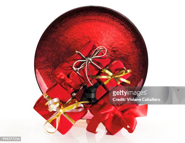 red gifts - viviane caballero stock pictures, royalty-free photos & images