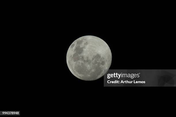 blue moon - blue moon stock pictures, royalty-free photos & images