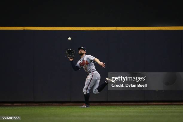 Ender Inciarte of the Atlanta Braves catches a fly ball in the sixth inning against the Milwaukee Brewers at Miller Park on July 5, 2018 in...