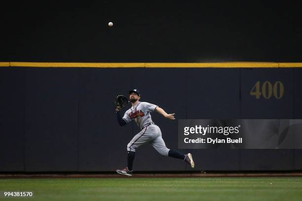 Ender Inciarte of the Atlanta Braves catches a fly ball in the sixth inning against the Milwaukee Brewers at Miller Park on July 5, 2018 in...