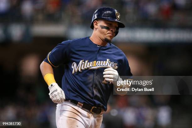 Hernan Perez of the Milwaukee Brewers rounds the bases after hitting a home run in the eighth inning against the Atlanta Braves at Miller Park on...