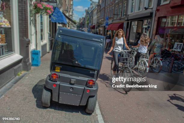 mini disabled cars new trendy means of transport in amsterdam - ballpoint pen stock pictures, royalty-free photos & images