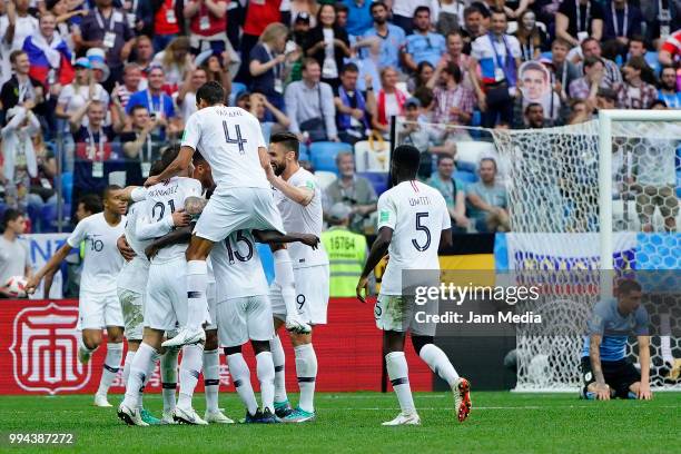 Players of France celebrate after scoring the second goal of their team during the 2018 FIFA World Cup Russia Quarter Final match between Uruguay and...