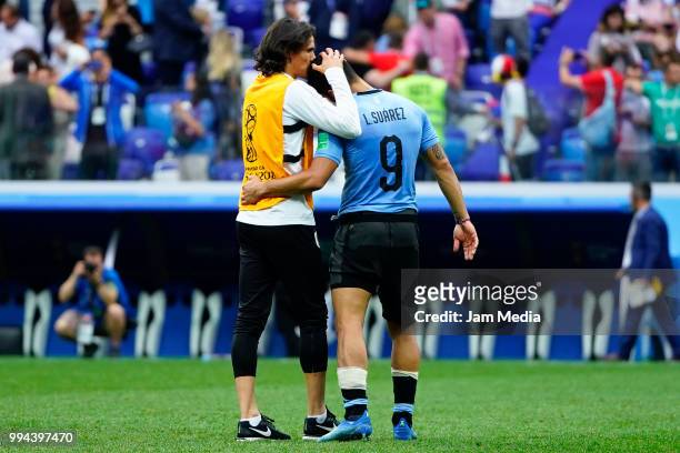 Edinson Cavani and Luis Suarez of Uruguay lament during the 2018 FIFA World Cup Russia Quarter Final match between Uruguay and France at Nizhny...