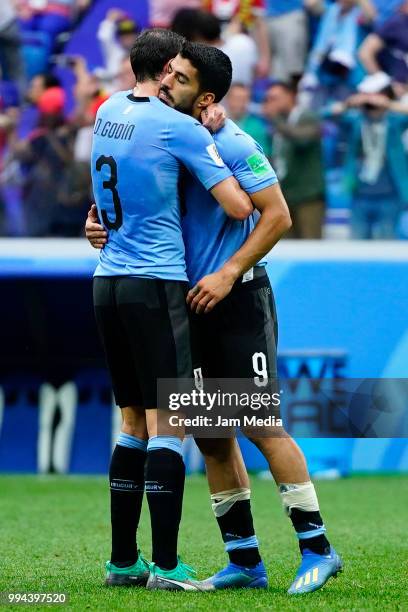 Diego Godín and Luis Suarez of Uruguay lament during the 2018 FIFA World Cup Russia Quarter Final match between Uruguay and France at Nizhny Novgorod...