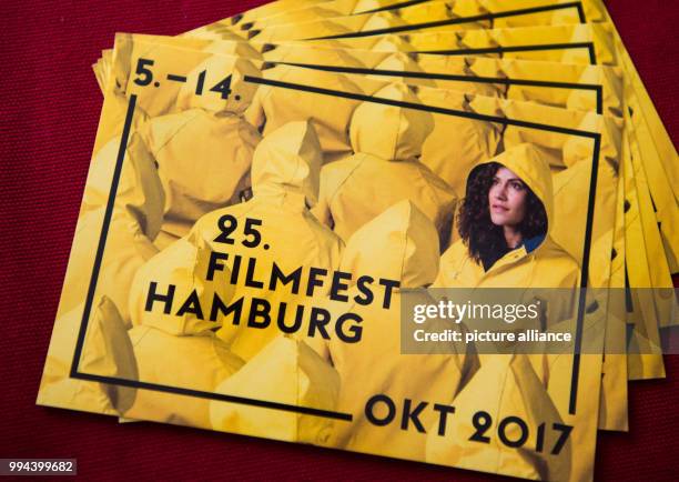 Postcards of the 25th Film festival Hamburg can be seen during a press conference at the Chile House in Hamburg, Germany, 19 September 2017. The...