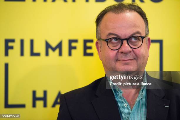 Director of the festival Albert Wiederspiel speaks during a press conference of the Film festival Hamburg at the Chile House in Hamburg, Germany, 19...