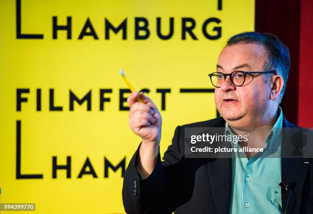 Director of the 25th Filmfest Hamburg, Albert Wiederspiel speaks during a press conference of festival at the Chile House in Hamburg, Germany, 19...