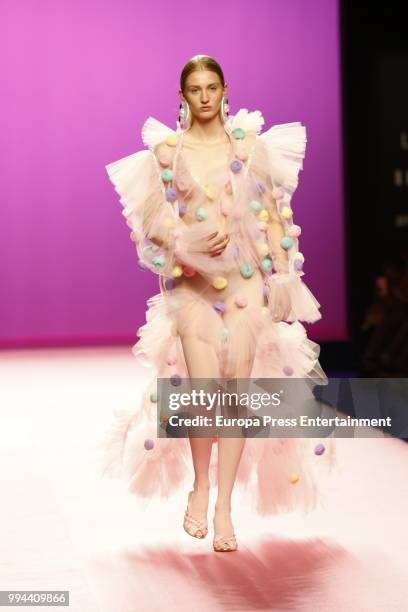 Model walks the runway during Maria Escote show at Mercedes Benz Fashion Week Madrid Spring/ Summer 2019 on July 8, 2018 in Madrid, Spain. On July 8,...