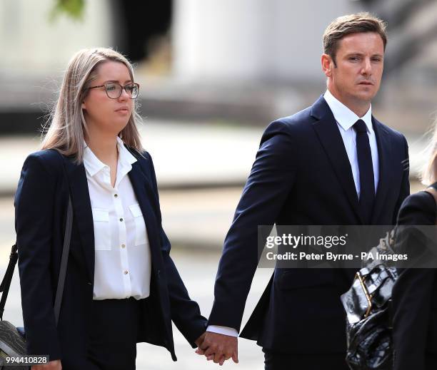 Liam Rosney, 32 and Victoria Rosney arrive at Mold Crown Court, in Mold where they are charged in connection with death of Olympic cyclist Chris...