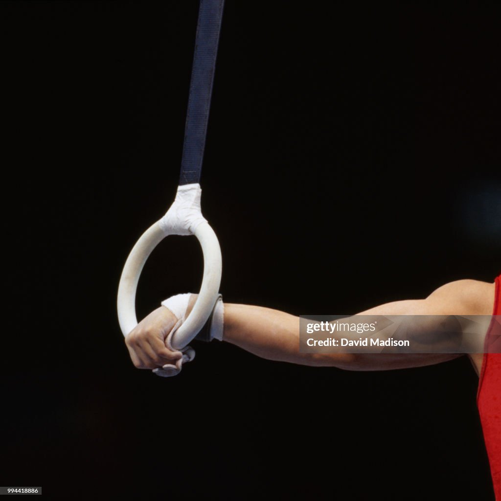 Gymnast performing on rings