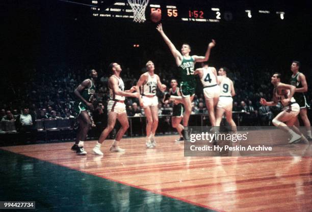 Tom Heinsohn of the Boston Celtics shoots the lay-up during an NBA game against the New York Knicks on October 25, 1958 at the Madison Square Garden...