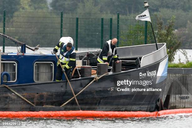 Freight barge on the River Danube near the lock in Straubing, Germany, 20 September 2017. After a leak in the engine room, the fire service pumped...