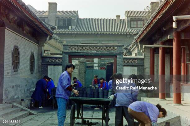 the nineties. restoration work inside the forbidden city. beijing, china. - forbidden city imagens e fotografias de stock