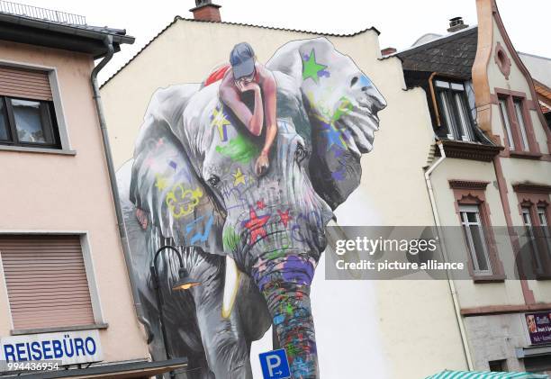 Mural of the Bad Vilbeler artist Case can be seen on a facade in Bad Vilbel, Germany, 20 September 2017. The elephant picture is based on a graffiti...