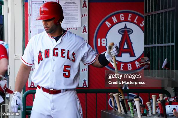 Albert Pujols of the Los Angeles Angels of Anaheim looks on during the MLB game against the Los Angeles Dodgers at Angel Stadium on July 8, 2018 in...