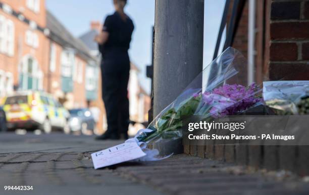 Flowers at the scene in Rollestone Street, Salisbury, where counter-terrorism officers are investigating after Dawn Sturgess died after she and her...