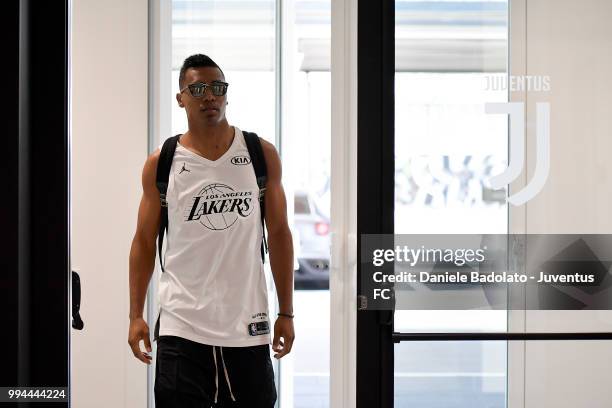 Alex Sandro attends a Juventus training session at Juventus Training Center on July 9, 2018 in Turin, Italy.