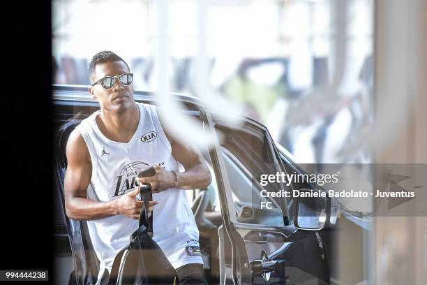 Alex Sandro attend a Juventus training session at Juventus Training Center on July 9, 2018 in Turin, Italy.