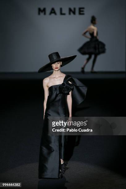 Models walk the runway at the Malne show during the Mercedes-Benz Fashion Week Madrid Spring/Summer 2019 at IFEMA on July 9, 2018 in Madrid, Spain.