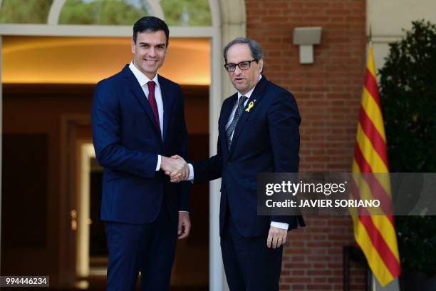 Spanish Prime Minister Pedro Sanchez welcomes Catalan regional president Quim Torra at the Moncloa Palace in Madrid on July 9, 2018. Prime minister...