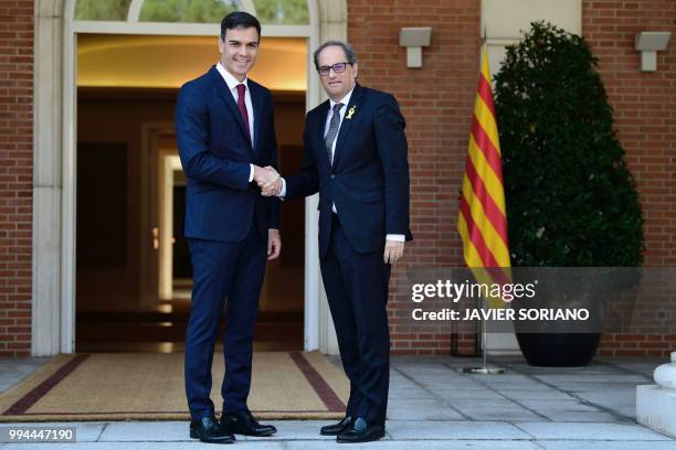 Spanish Prime Minister Pedro Sanchez welcomes Catalan regional president Quim Torra at the Moncloa Palace in Madrid on July 9, 2018. Prime minister...