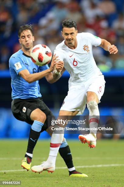 Jose Fonte of Portugal clears from Rodrigo Bentancur of Uruguay during the 2018 FIFA World Cup Russia Round of 16 match between Uruguay and Portugal...