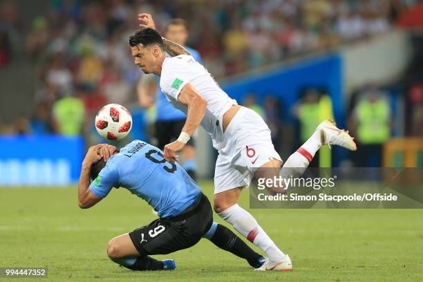 Jose Fonte of Portugal clashes with Luis Suarez of Uruguay during the 2018 FIFA World Cup Russia Round of 16 match between Uruguay and Portugal at...