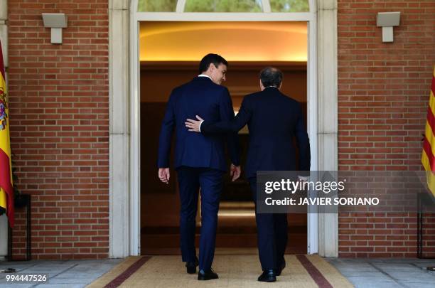 Spanish Prime Minister Pedro Sanchez welcomes Catalan regional president Quim Torra at the Moncloa Palace in Madrid on July 9, 2018. Prime minister...