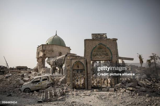 General view of the remains of the Al-Nuri mosque, where the Islamic State caliphate was proclaimed, in the old city of Mosul, Iraq, 21 September...