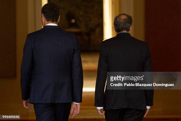 Spanish Prime Minister Pedro Sanchez and Catalan regional president Quim Torra walk as they meet at Moncloa Palace on July 9, 2018 in Madrid, Spain....