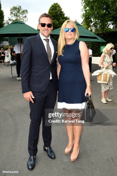 Ian Poulter and his wife Katie Poulter attend day seven of the Wimbledon Tennis Championships at the All England Lawn Tennis and Croquet Club on July...