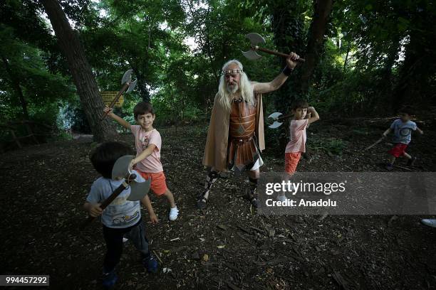 Performer is seen on the largest island of the Turkish Black Sea coast Giresun Island in Turkey on July 8, 2018. Myths about Amazons who once lived...