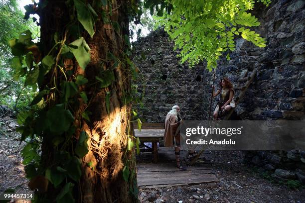 Performers are seen on the largest island of the Turkish Black Sea coast Giresun Island in Turkey on July 8, 2018. Myths about Amazons who once lived...